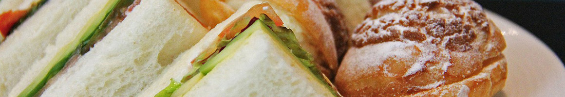 Eating Mediterranean Sandwich at Fyzas Alhadi restaurant in Houston, TX.